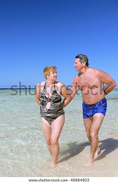 arthur carlos add Mature Couple Beach photo