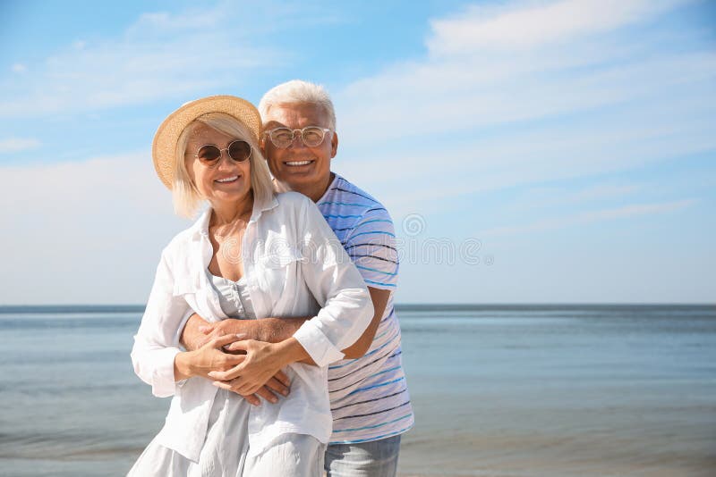 abidemi ashiru add Mature Couple Beach photo